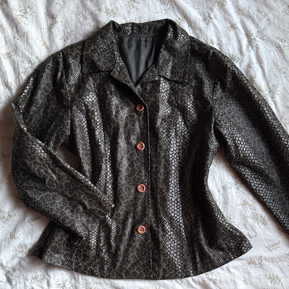Green animal print jacket with wooden buttons. Great condition size medium.